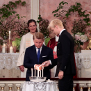 The Princess' brothers, Prince Sverre Magnus and Marius Borg Høiby, light their candles. Photo: Lise Åserud / NTB scanpix  Photo: Lise Åserud / NTB scanpix
